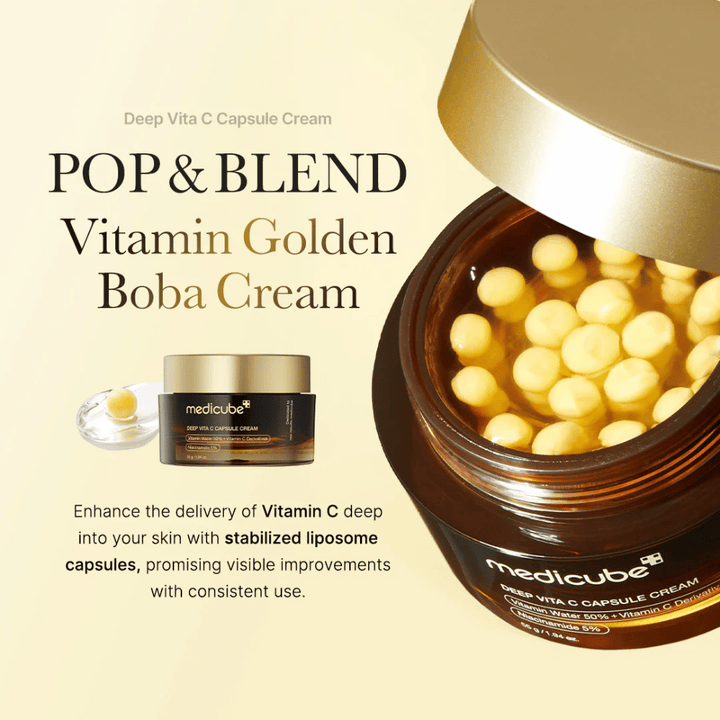 Förpackningen av "Medicube Deep Vita C Capsule Cream," en vitamin C-berikad kräm som innehåller stabiliserade liposomkapslar för att effektivt penetrera huden. Texten "POP & BLEND Vitamin Golden Boba Cream" betonar produktens egenskaper, och den visuella presentationen visar kapslarna som lovar synliga förbättringar med kontinuerlig användning.