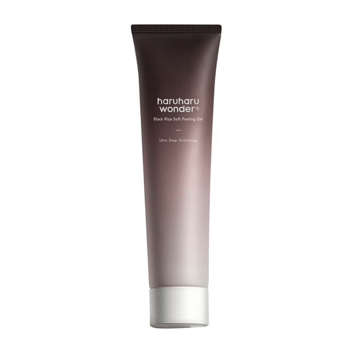 En tub Haruharu Wonder Black Rice Soft Peeling Gel 100ml med exfolierande egenskaper på en vit bakgrund.